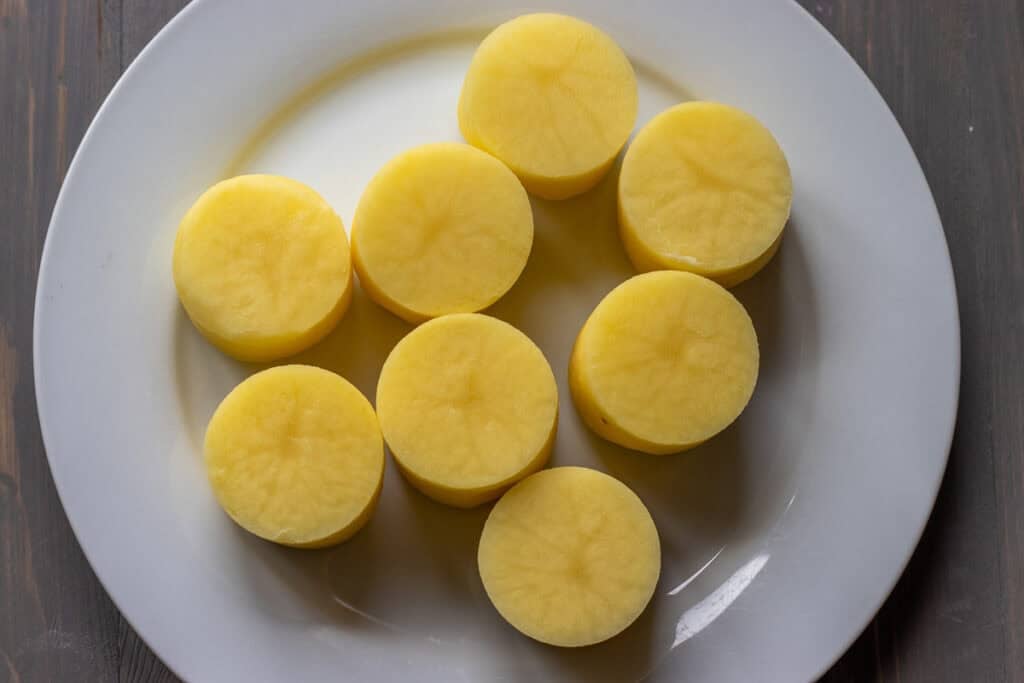 8 pieces of round cut potatoes for making fondant potatoes