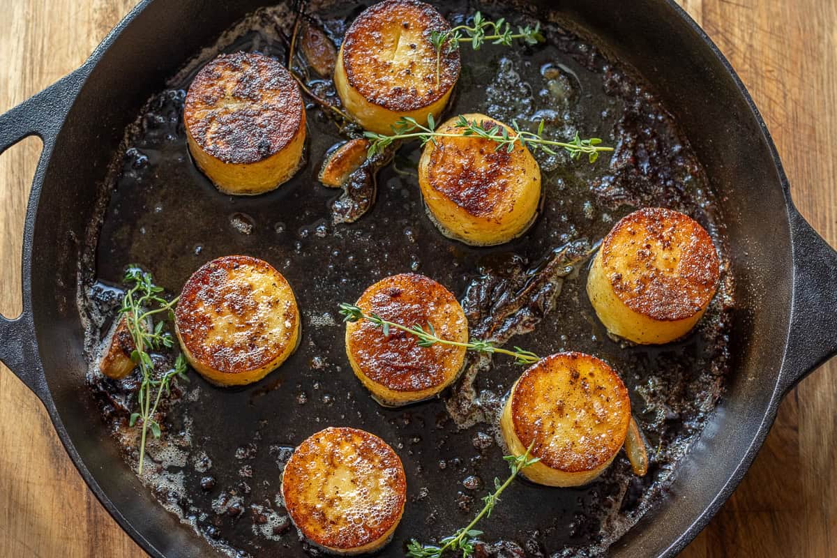 potatoes are cooked in broth until tender