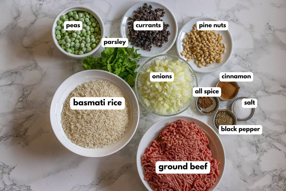 labelled picture of ingredients for hashweh rice recipe