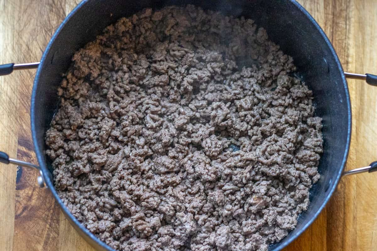browning the ground beef in a pot