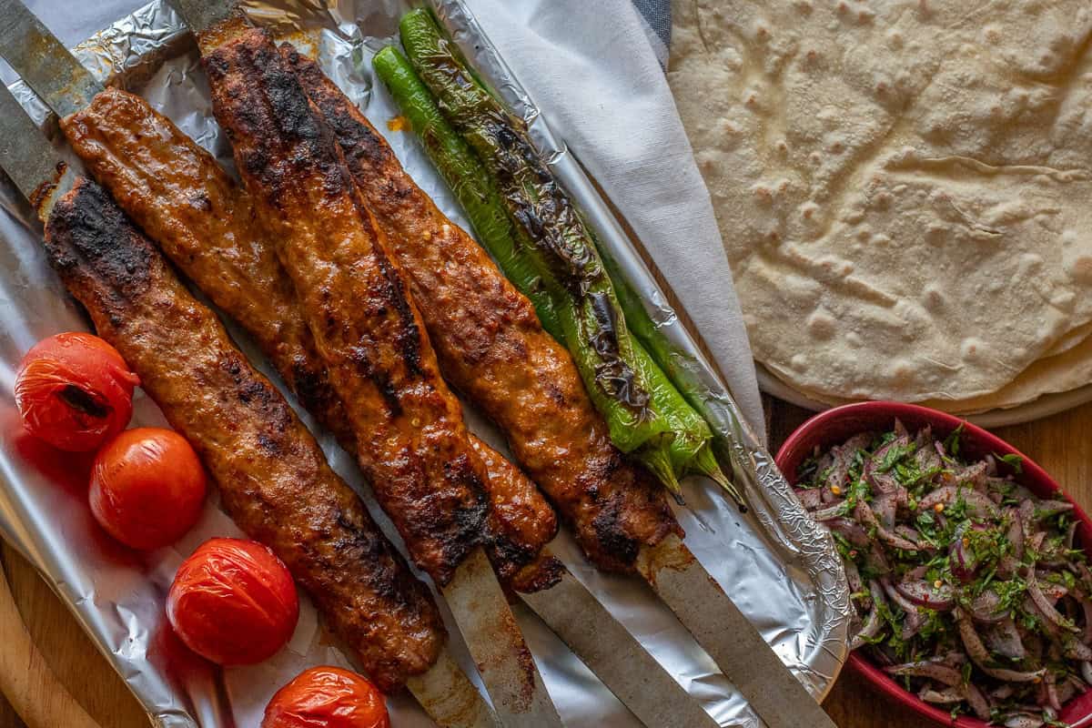 urfa lamb kebab served with lavash bread and sumac onions