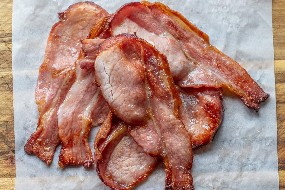 Bacon on a cutting board.