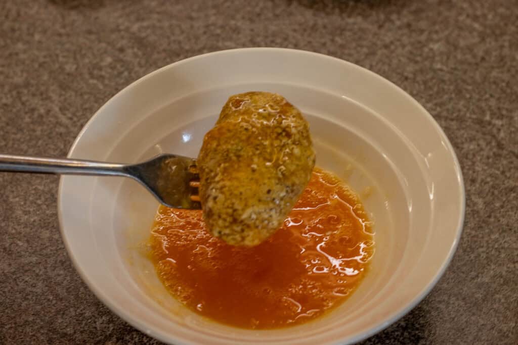 meatball is dipped in egg