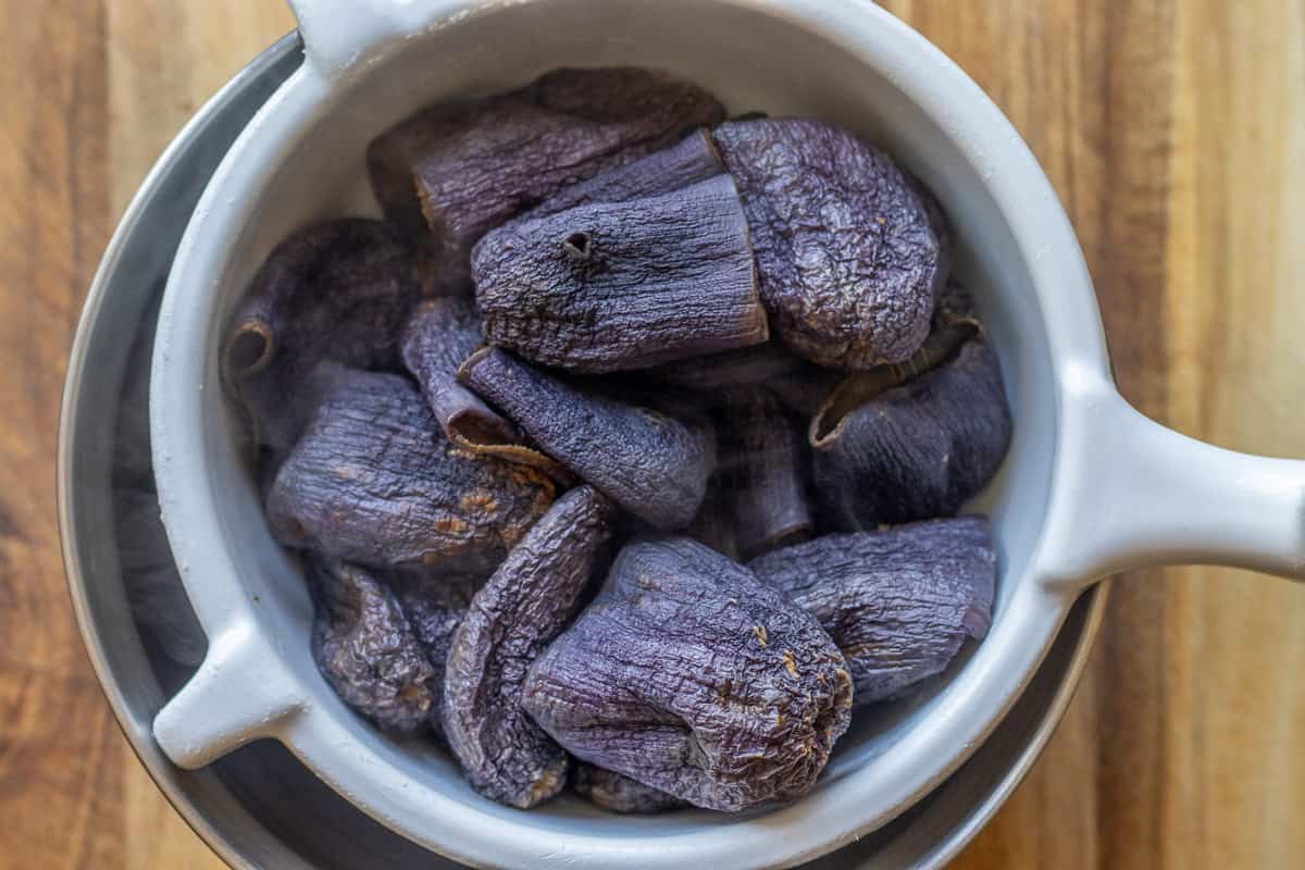 soaked dried eggplants let to drain on a colander