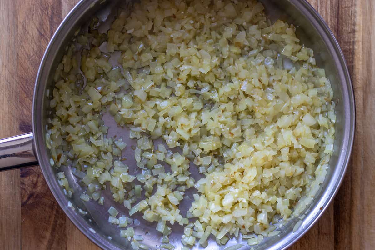 sautéing onions in olive oil until soft