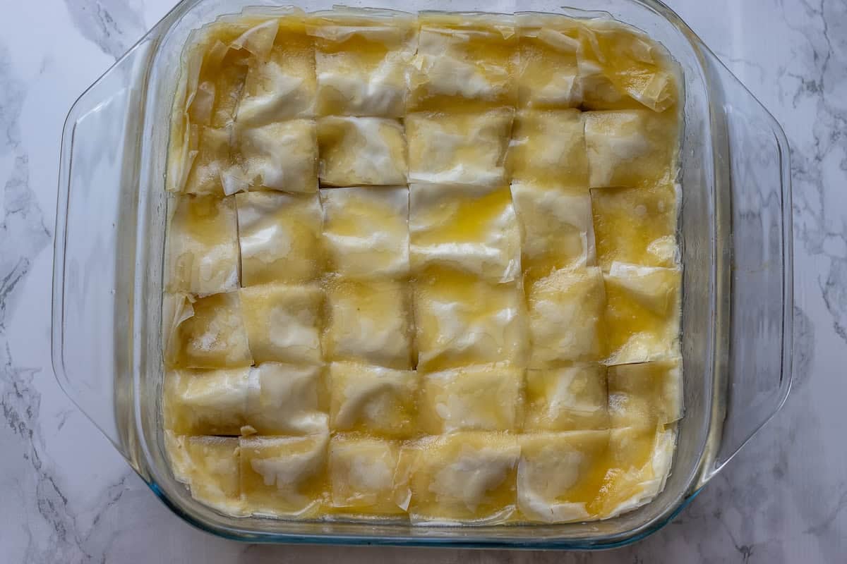 soguk baklava is layered and cut into squares