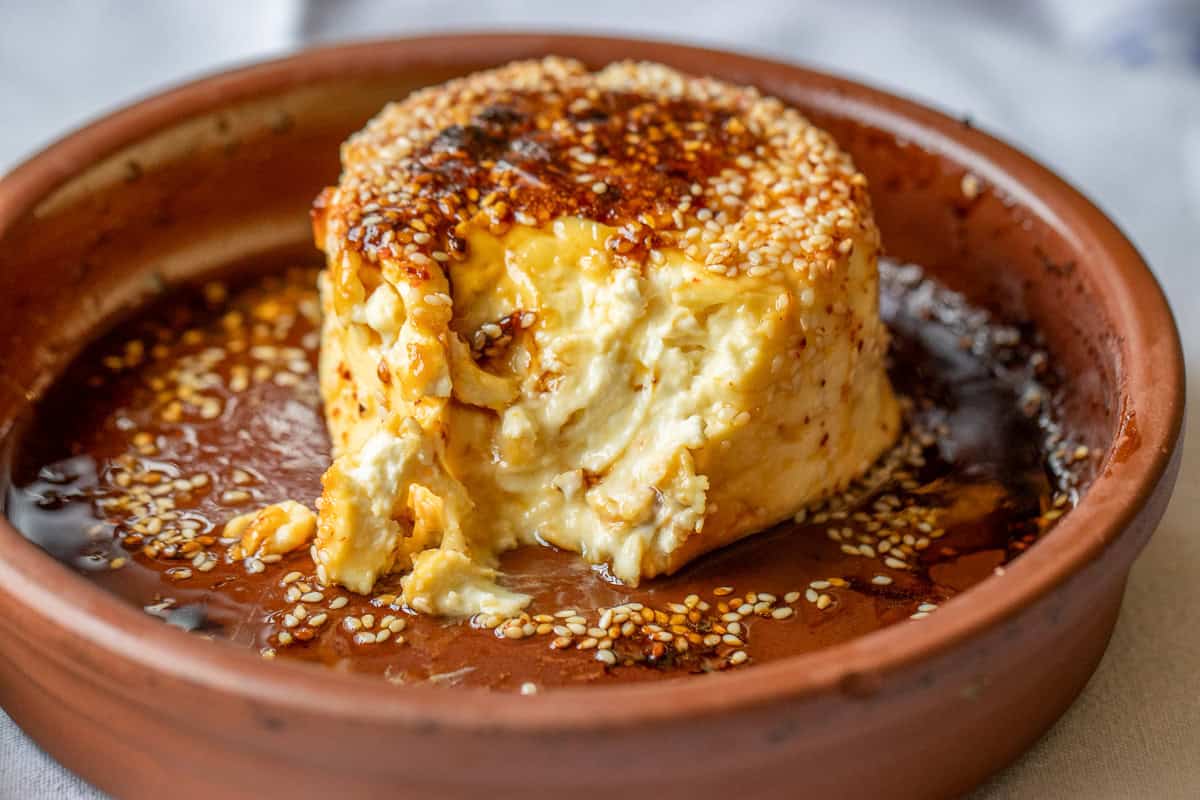 baked feta with honey in a baking dish