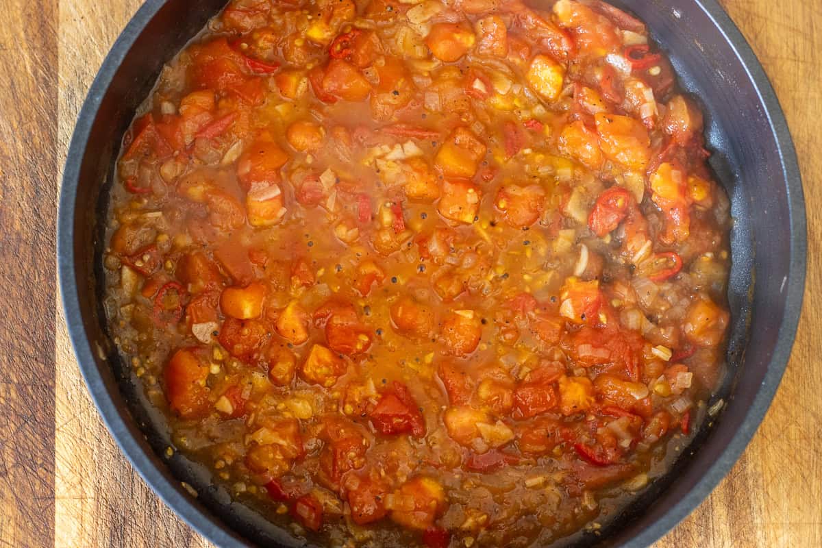 tomatoes are cooked until softened