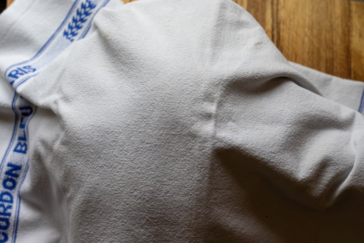 yogurt pot wrapped in towels to keep warm