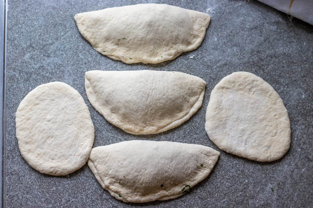 pisi dough is shaped into 5 pastries