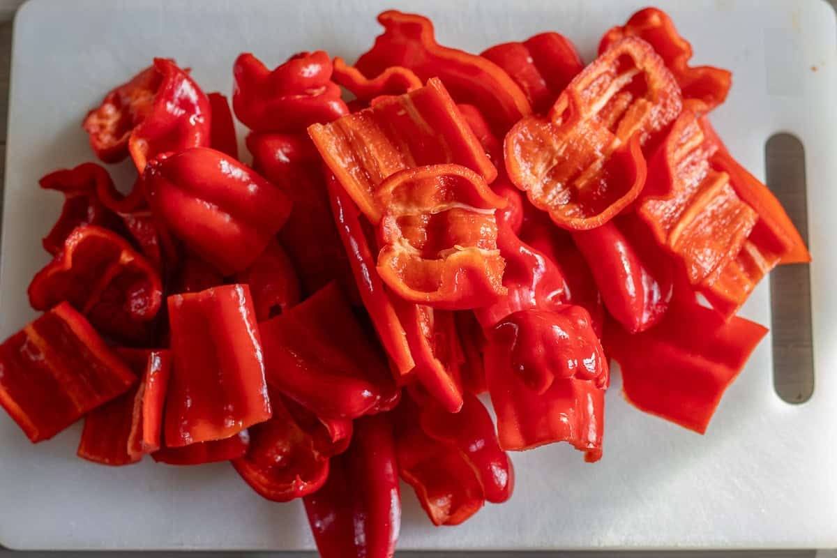 Red peppers are deseeded and cut into chunks for making red pepper paste