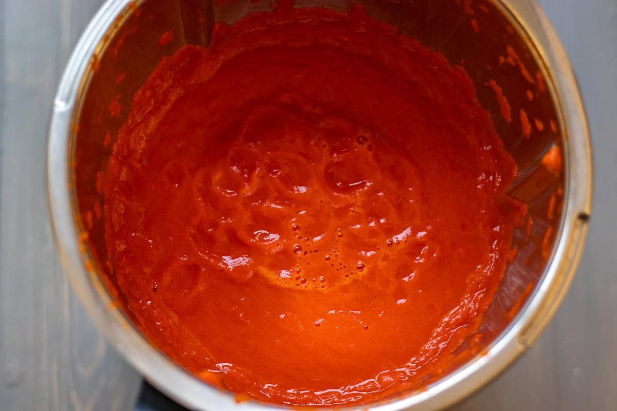 cooked red peppers are blitzed until smooth