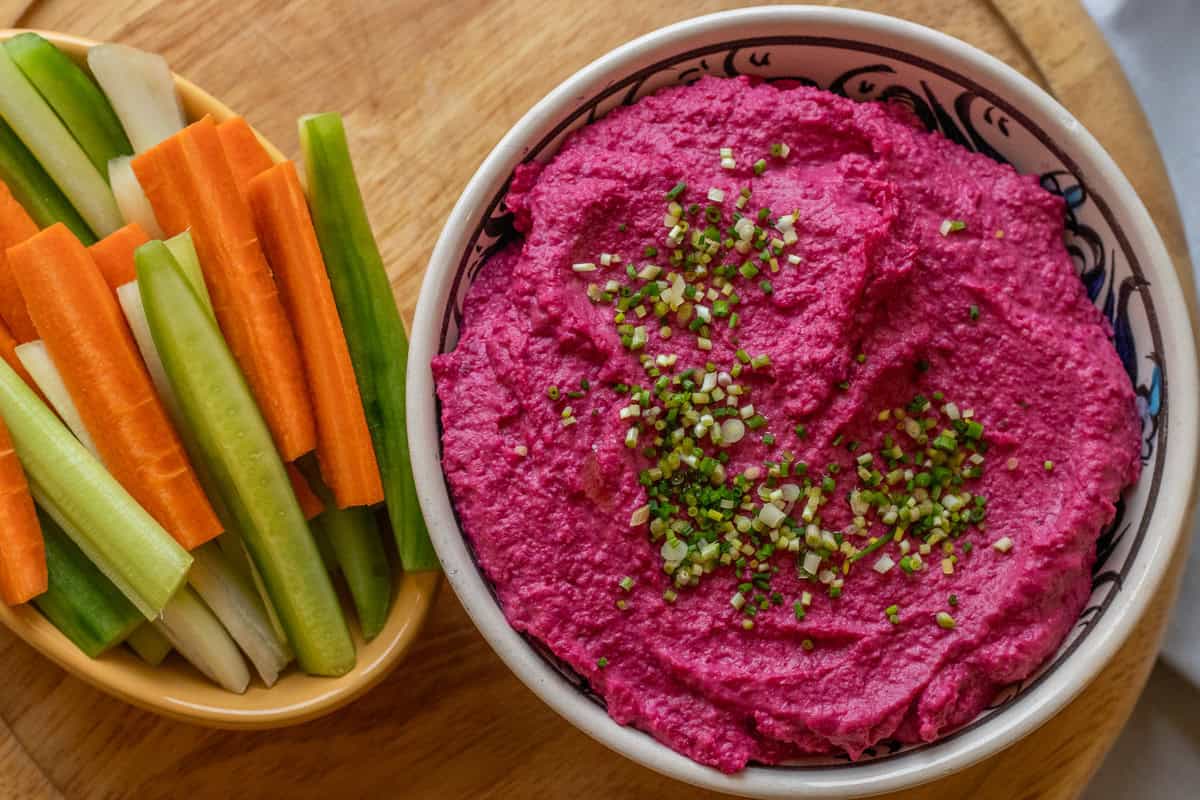 beet hummus served with crudities